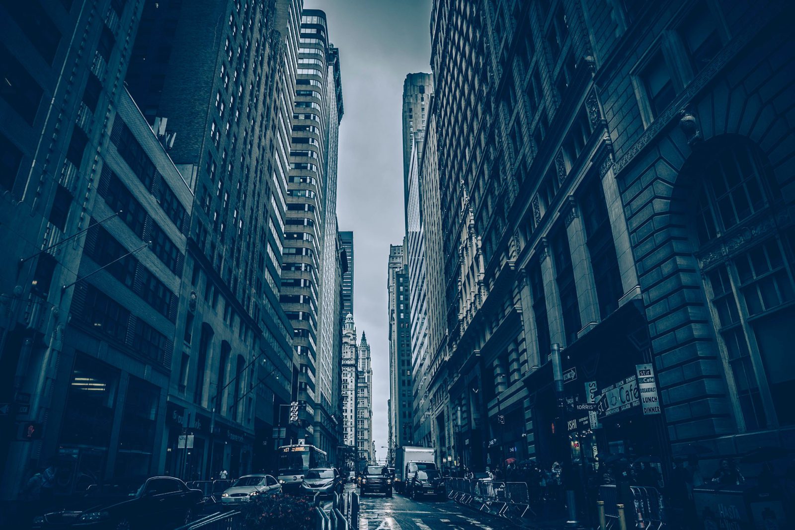 An image of a city street with tall buildings.